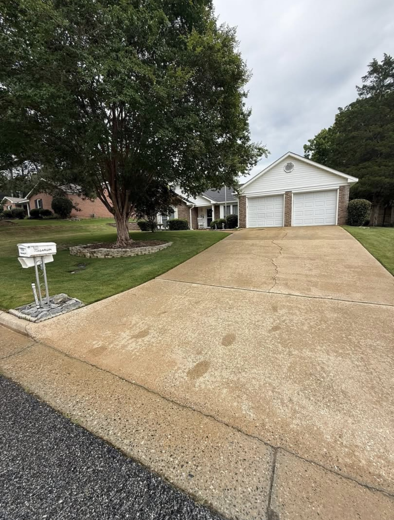 Clean concrete driveway after pressure washing in Columbus, GA