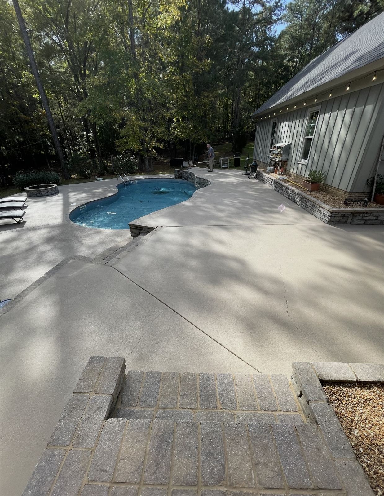 Bright, even pool deck concrete after pressure washing in Columbus, Georgia