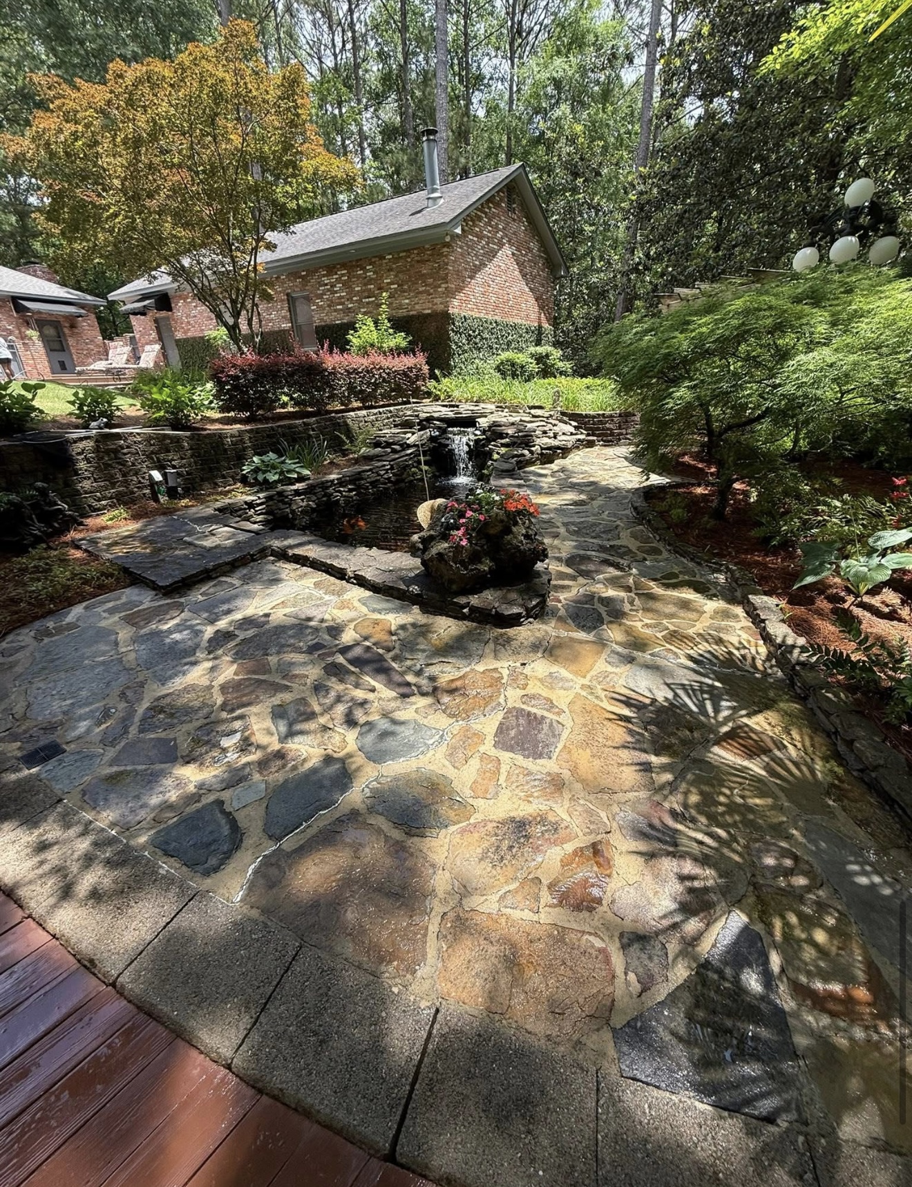 Clean flagstone patio after pressure washing in Columbus, GA